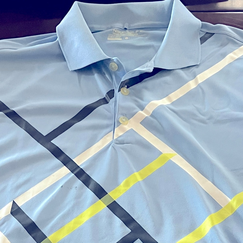 Nike golf shirt size large. Slimmer fit.
